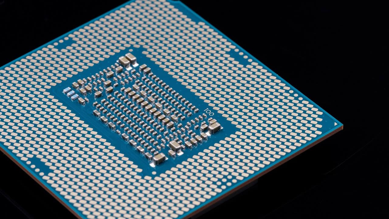 An Intel CPU with a flat bottom and contact pads