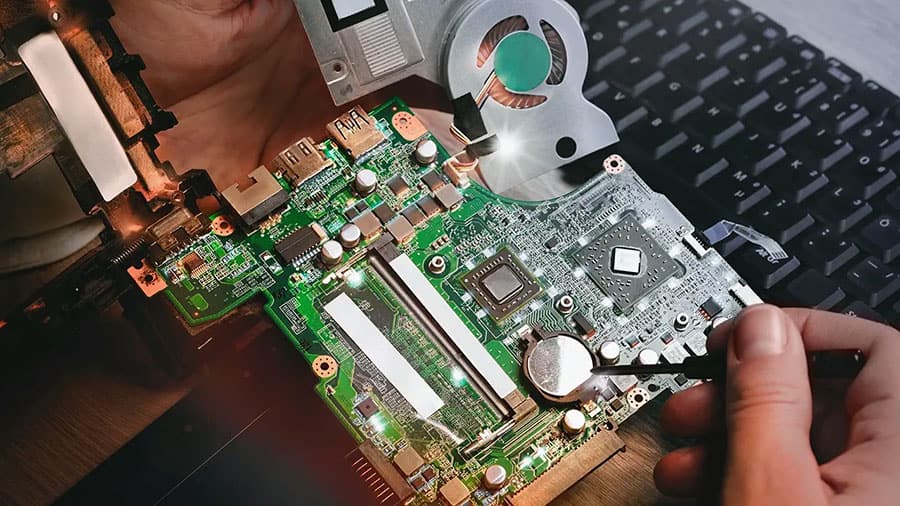 A laptop motherboard with a dedicated GPU.