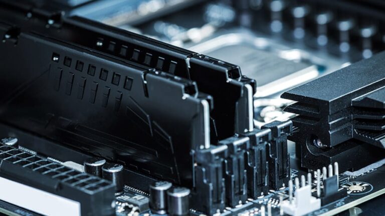 Close up of RAM modules installed onto a motherboard.