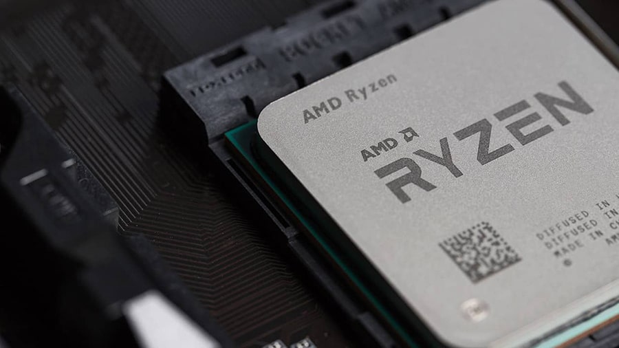 An AMD Ryzen CPU installed onto a motherboard.