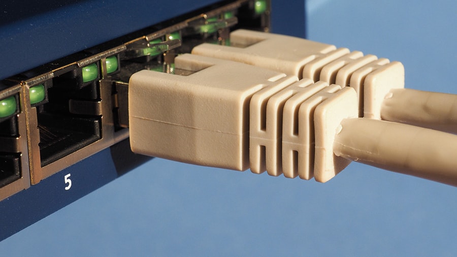 Ethernet connectors are plugged into an ethernet network switch.