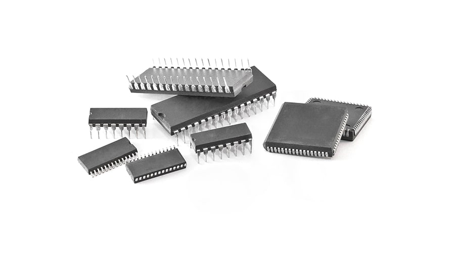 A pile of integrated circuits or ICs.