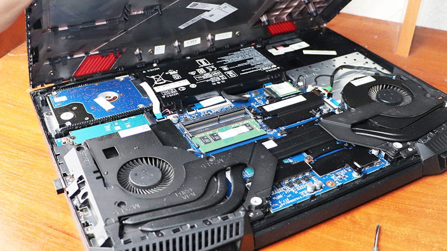 An open laptop displaying the internal cooling system.