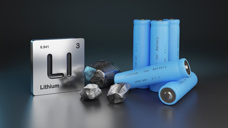 The Lithium element symbol from the periodic chart next to lithium ion batteries.