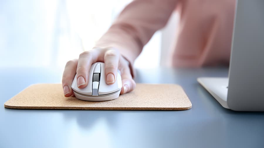 Using a mouse on a pad.